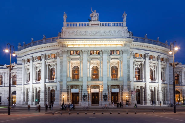 Burgtheater Vienna At Night Vienna: Burgtheater at Ring Strasse is a historic building and travel location in capital city of AustriaVienna: Burgtheater at Ring Strasse is a historic building and travel location in capital city of Austria burgtheater vienna stock pictures, royalty-free photos & images