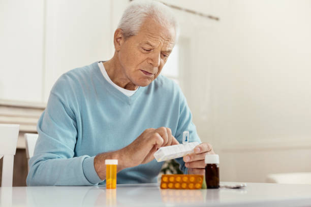 istock Unhappy cheerless man taking medicine 840757314