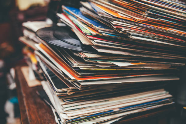 Retro Styled LP Records Retro styled lp records on a flea market. sleeve photos stock pictures, royalty-free photos & images