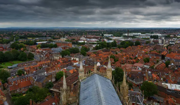 Wide angle shot of the York Minster and surrounding countryside in Yorkshire, England, UK against a dramatic sky