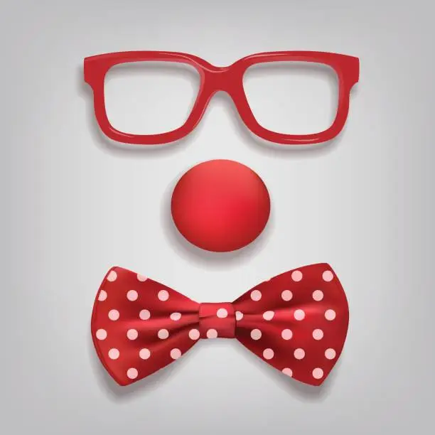 Vector illustration of Clown accessories isolated on gray background. Vector clown glasses, nose and bow tie polka dot.