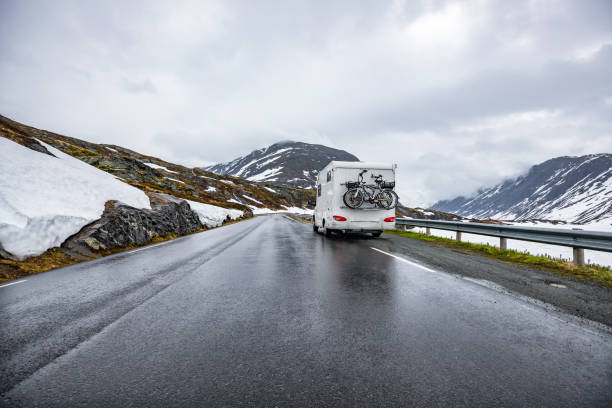 istock Caravan car travels on the highway. 840781734