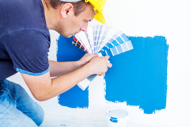 istock Worker choosing paint colors at home 840782194