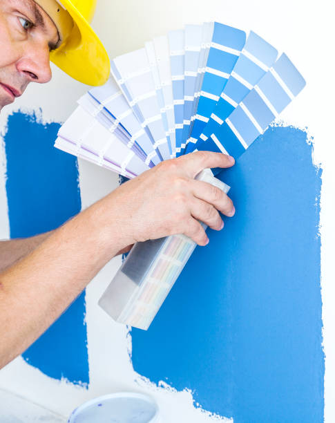 istock Worker choosing paint colors at home 840782388