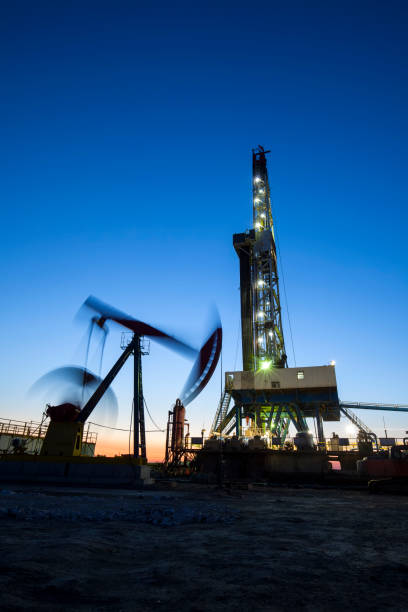 istock Oilfield derrick 840782958