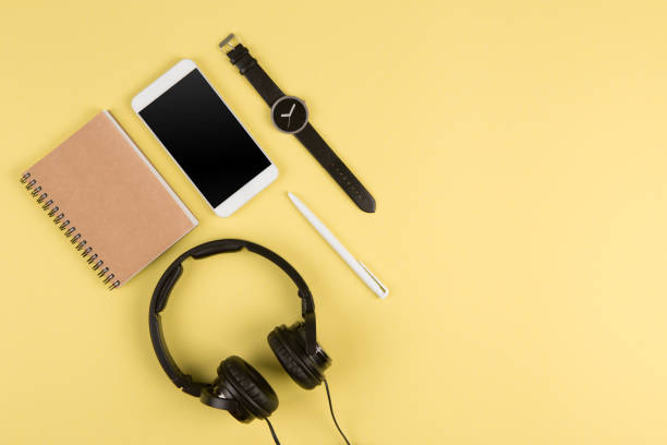 istock Smartphone, notepad, headphones, pen and watch 840788334