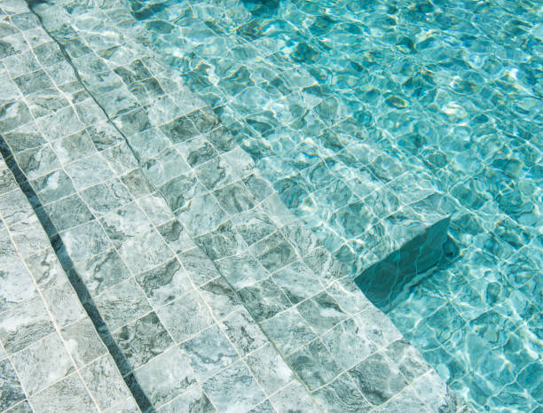istock swimming pool, mosaic tiles outdoor 840788696