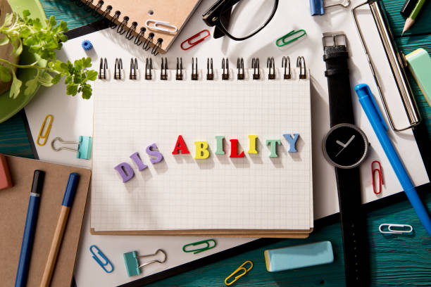 istock disability concept - inscription  on the desk 840793450