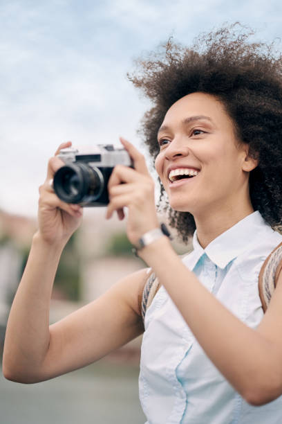 istock Mixed race tourist taking photo 840793788