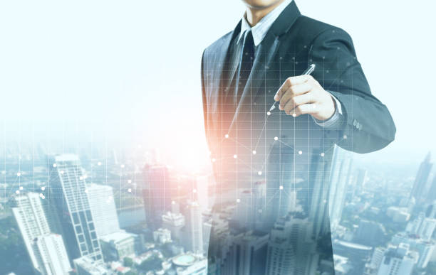istock businessman present increasing graph with city background, business growth 840794666