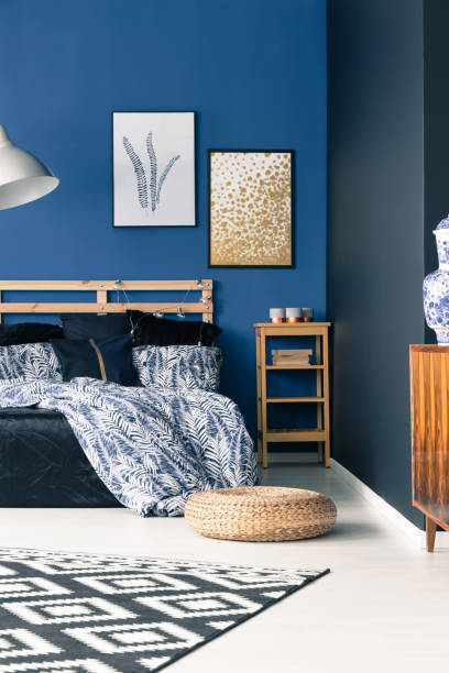 istock Sophisticated bedroom with blue walls 840802592