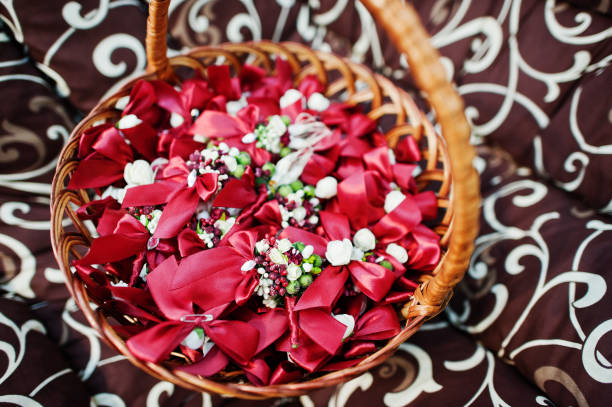 Red flower petals in the wicker basket.