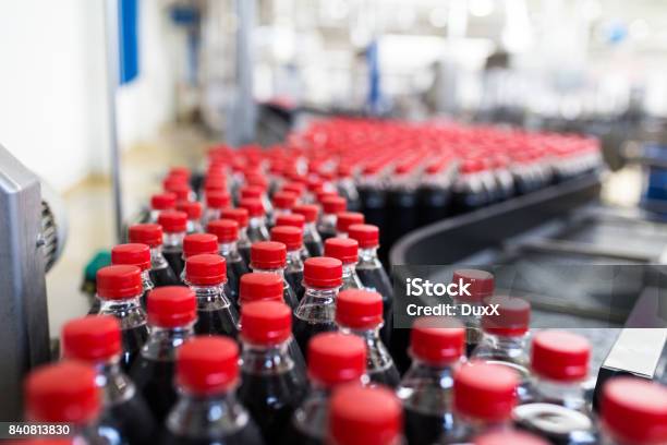 Juice And Soda Production Factory Stock Photo - Download Image Now - Bottling Plant, Soda, In A Row