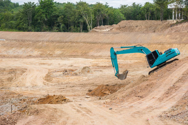 istock Blue backhoe excavating soil and sand 840815022