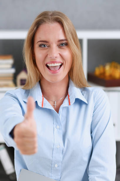istock Female arm show OK or approval with thumb up 840815942