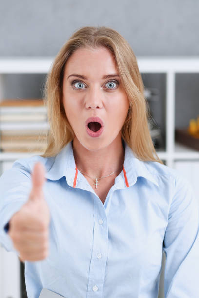 istock Female arm show OK or approval with thumb up 840815966