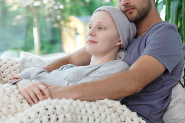 istock Supporting tired wife after chemotherapy 840816168