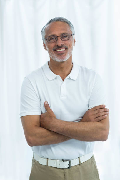 istock Physiotherapist standing with arms crossed 840818404