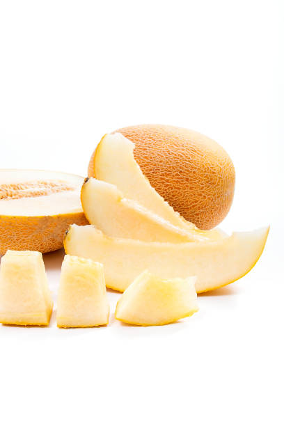 istock Whole, half and sliced honeydew melon isolated on white 840827350