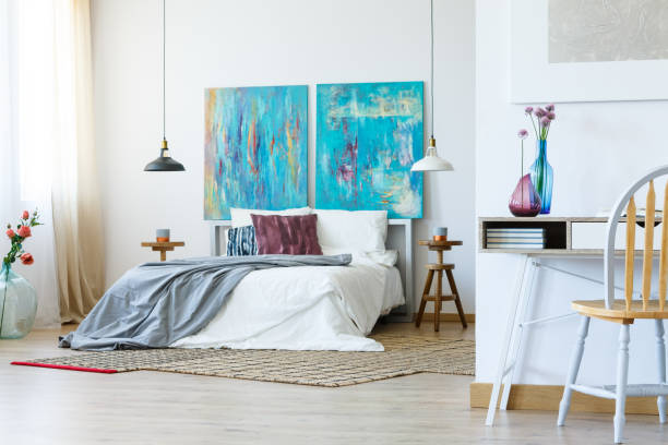 istock King-size bed, flowers and paintings 840831914