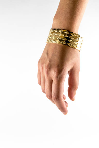 istock female wrist with jewelry on white background 840835676