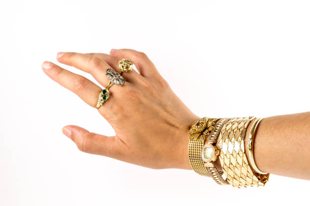 istock female wrist with jewelry on white background 840837766