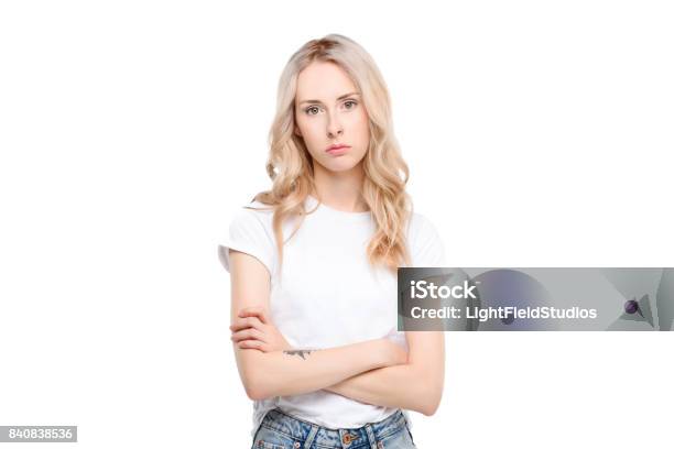 Young Woman With Arms Crossed Stock Photo - Download Image Now - Women, One Woman Only, White Background