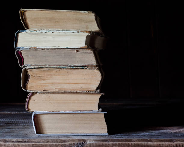 istock Old books lie on top of each other. 840841486
