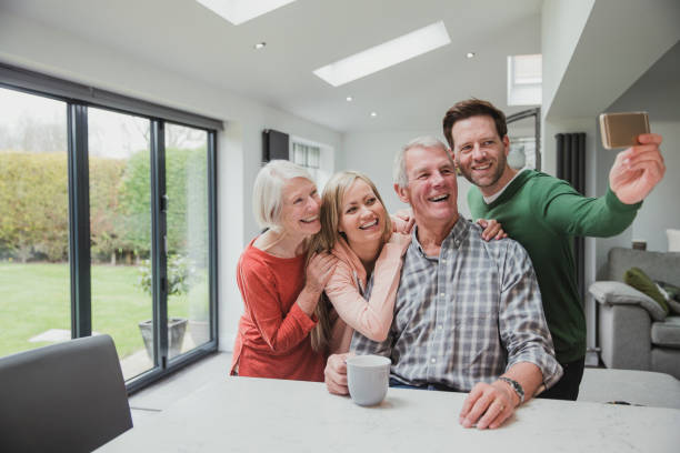 familia selfie en casa - son in law fotografías e imágenes de stock