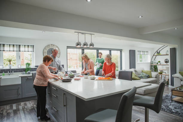 istock Family Cooking A Meal Together 840845620