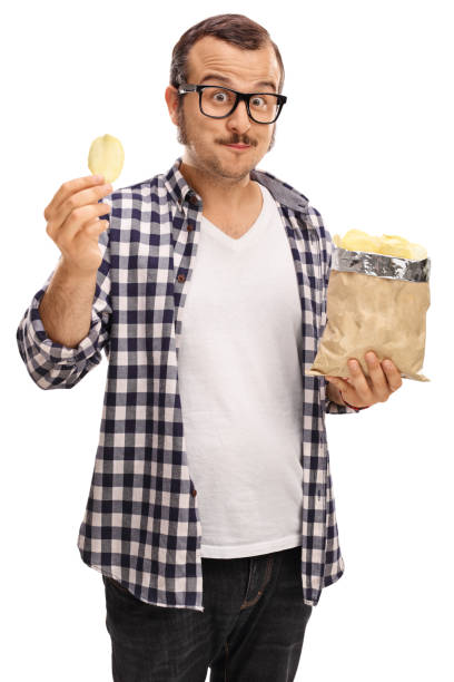 Man with a bag of potato chips looking at the camera