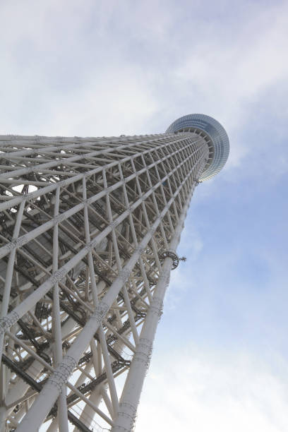 Tokyo sky tree with airplane trail