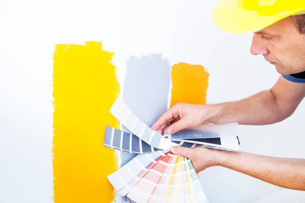istock Worker choosing paint colors at home 840850064