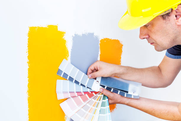 istock Worker choosing paint colors at home 840850094