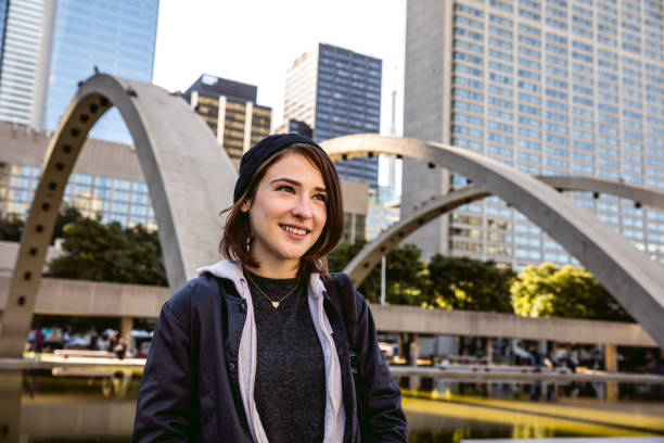 istock Young woman portrait in downtown Toronto 840853746
