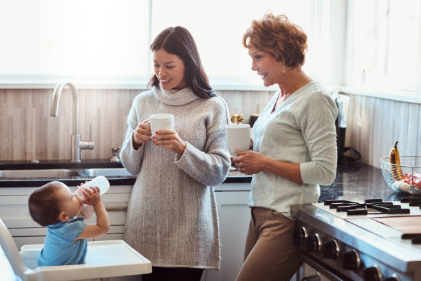 istock Showing off her milk drinking skills to mom and gran 840854704