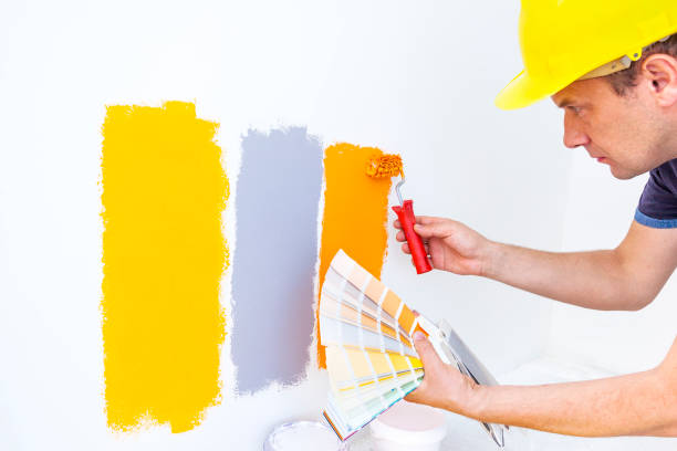istock Worker choosing paint colors at home 840855154