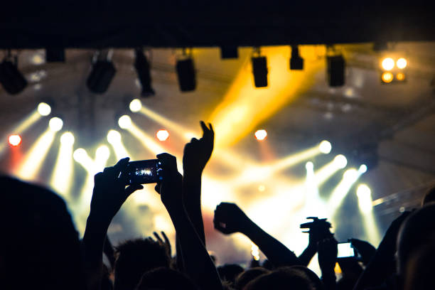 istock Concert crowd filming with smart phones 840858262