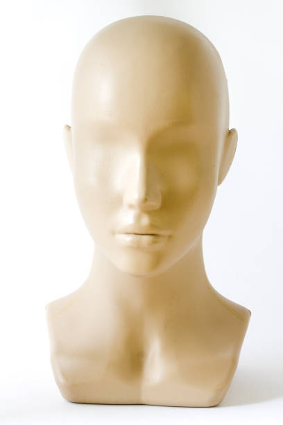 close-up of an old doll head without eyes
