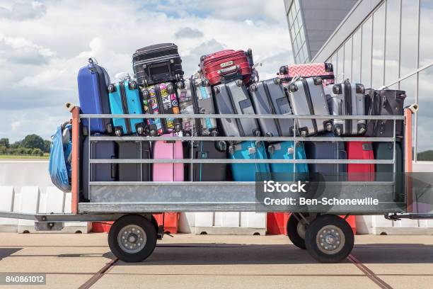 Trailer On Airport Filled With Suitcases Stock Photo - Download Image Now - Luggage, Airport, Luggage Cart