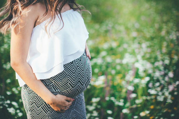 istock Pregnant young woman relaxing 840873962