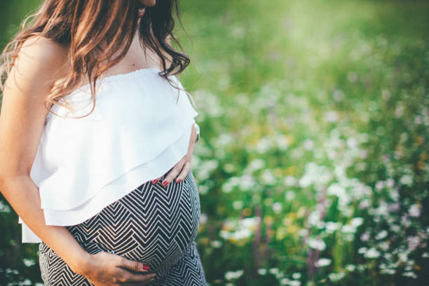 istock Pregnant young woman relaxing 840874246