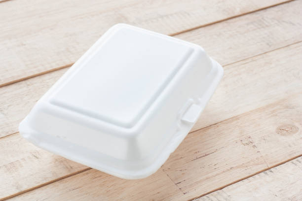 istock Foam box on wood background. 840882234
