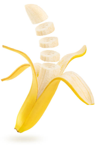 plasterki banana unoszące się na białym tle - peeled juicy food ripe zdjęcia i obrazy z banku zdjęć