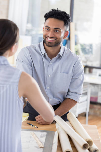 istock Young male architect meets job candidate during interview 840890228