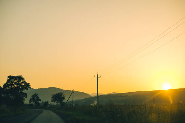 istock Old highway against mountains and a cloudy sky 840892068