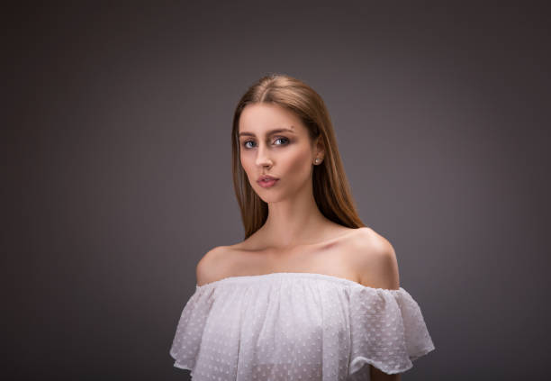 istock Beautiful girl in white blouse 840898870