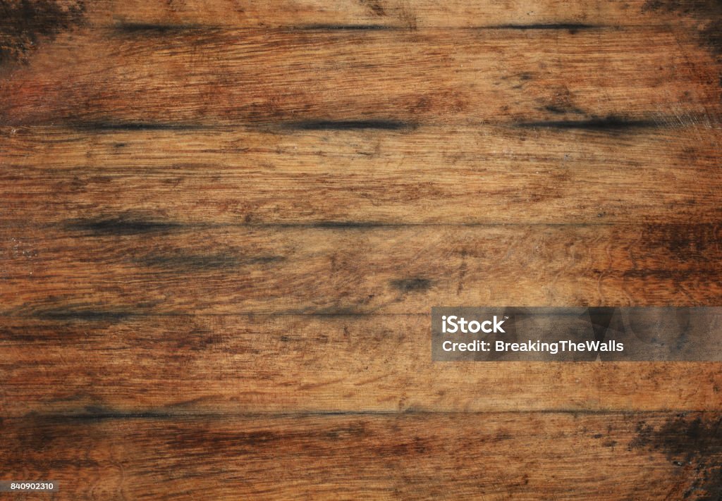 Old aged brown wooden planks background texture Vintage brown barrel wooden planks background texture with scratches and black stains over wood grain of old aged oak barrel bottom, close up Barrel Stock Photo
