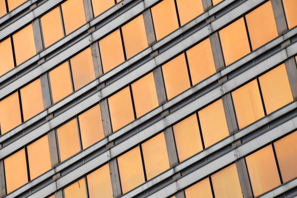 istock Modern business building glass windows at sunset 840903190