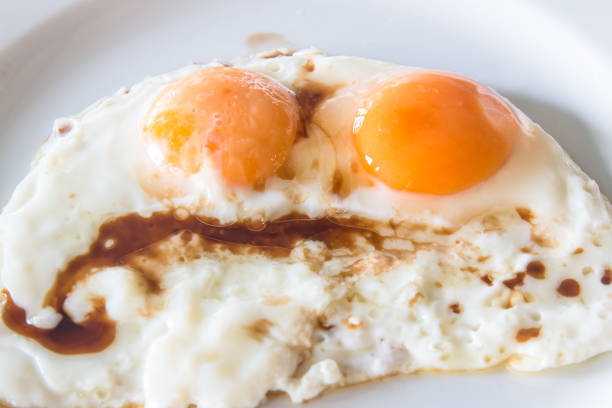 istock Two fried eggs for healthy breakfast food concept 840920240
